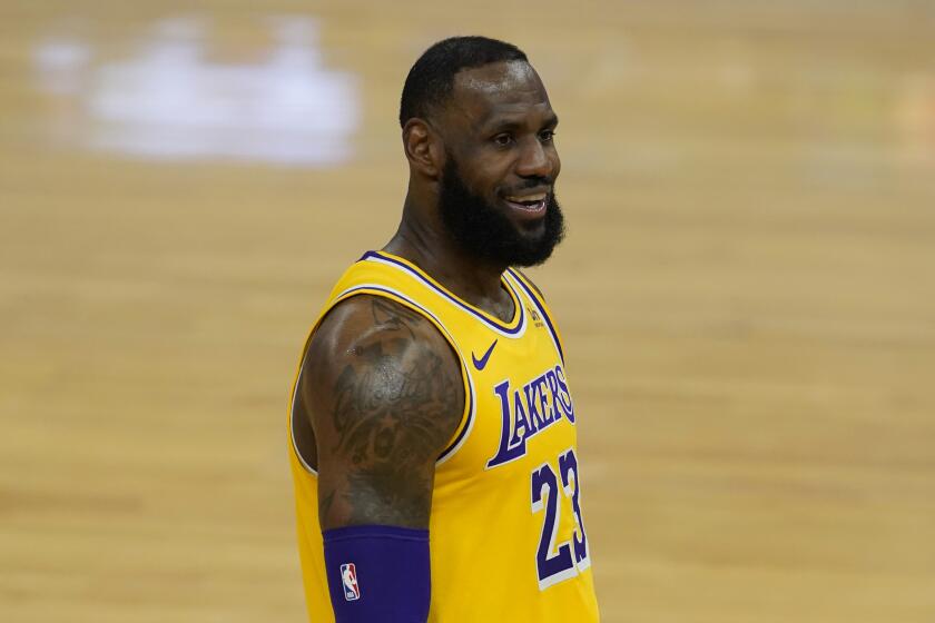 Los Angeles Lakers forward LeBron James (23) smiles during an NBA basketball game against the Golden State Warriors in San Francisco, Monday, March 15, 2021. (AP Photo/Jeff Chiu)