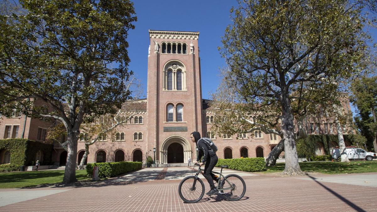 A person bikes March 12 across USC's campus.