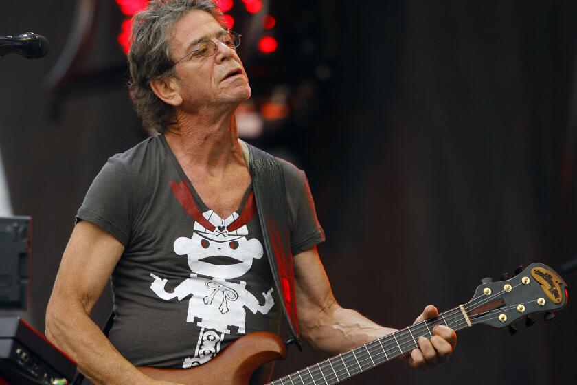 Lou Reed, seen performing at Lollapalooza in 2009, died Sunday. The influential New York rocker inspired countless musicians, including U2, Matthew Sweet and Cowboy Junkies.