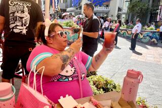 Nevis Aguillon was among the first people in line at the grand opening of The Hello Kitty and Friends Cafe in Los Angeles.