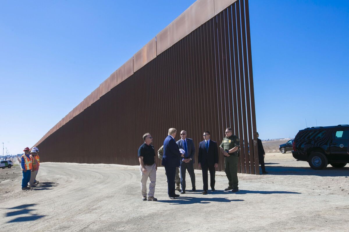 Then-President Donald Trump toured the new border wall east of Otay Mesa Port of Entry.