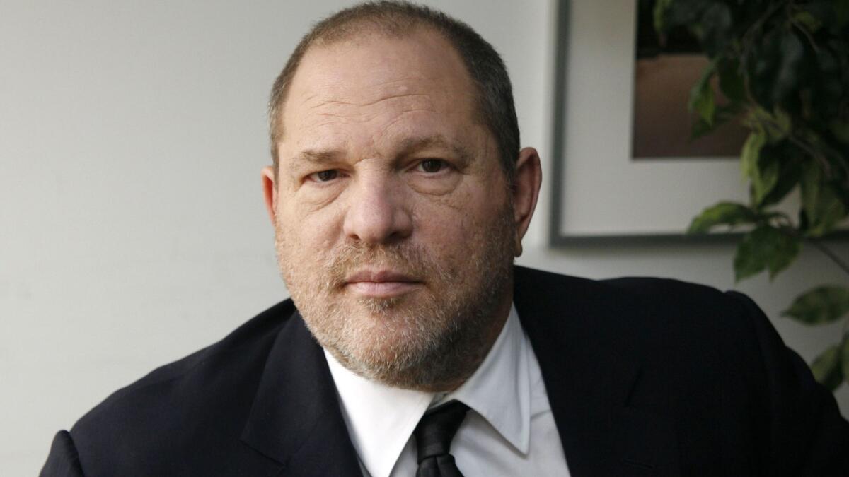 Harvey Weinstein poses for a photo in New York on Nov. 23, 2011.