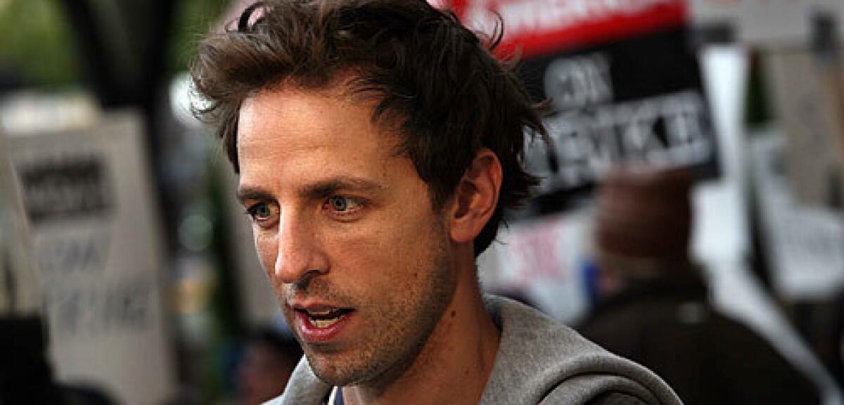 Saturday Night Lives Seth Meyers, shown during picketing, had a message for blogger Nikki Finke.