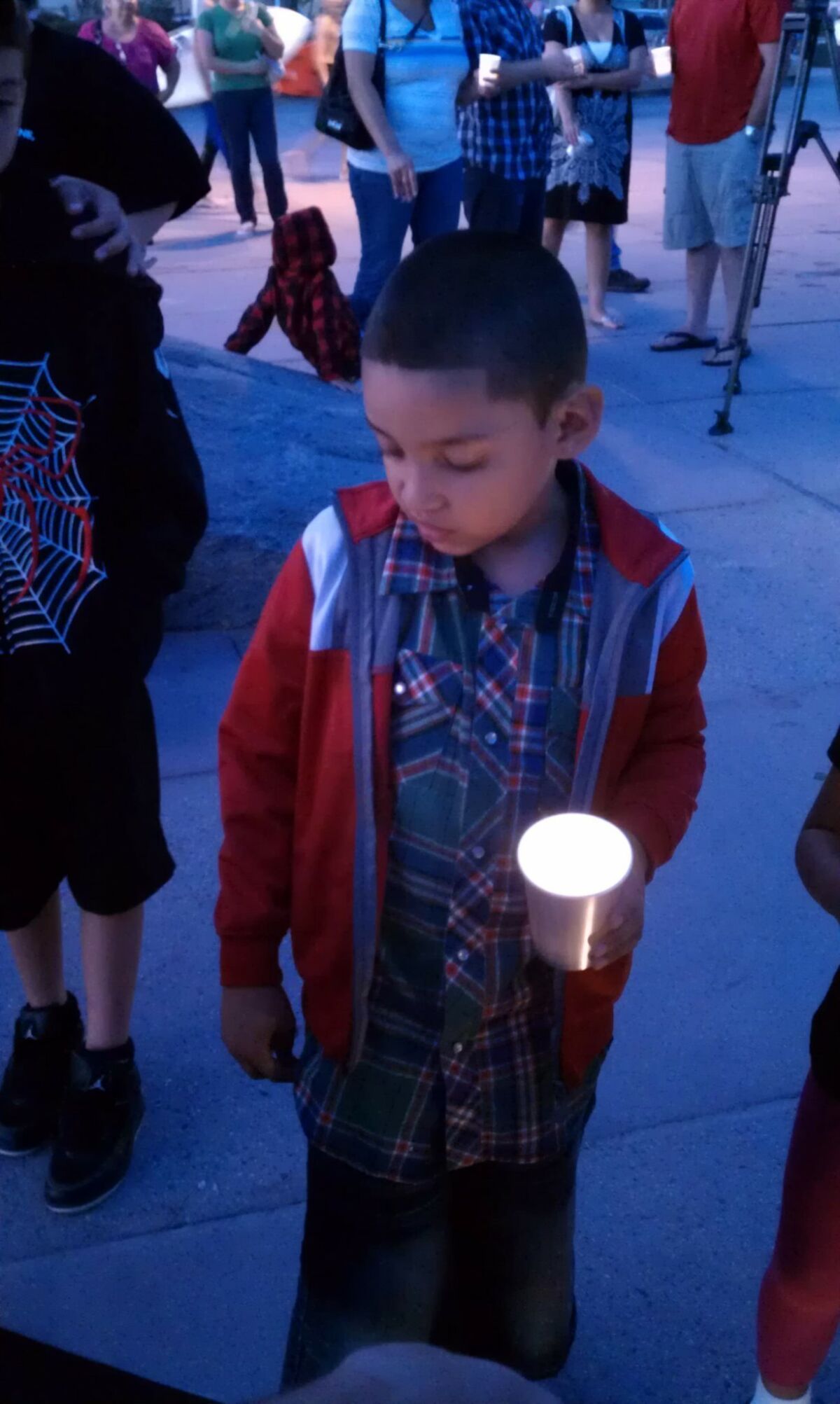 Jeremiah Saucedo at the vigil for his father. Susan Shroder / U-T San Diego