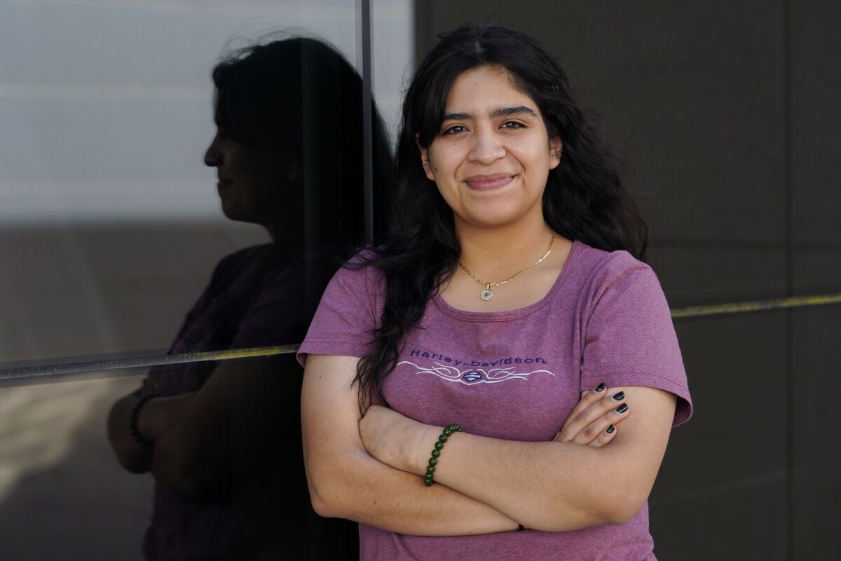 Veronika Granado, a student at UTSA, poses for a photo on campus, Monday, Oct. 4, 2021, in San Antonio. Granado had an abortion when she was 17 and living in the Rio Grande Valley and because she was underage, she had to get a judge to sign off on her abortion. With the new 6-week ban in Texas and efforts to replicate elsewhere, teens are looking at almost no possibility of getting an abortion in time. (AP Photo/Eric Gay)