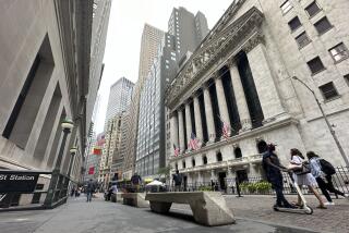 People pass the New York Stock Exchange on Tuesday, July 30, 2024 in New York. Wall Street is mixed as more companies post quarterly earnings numbers and the Federal Reserve prepares to convene its latest monetary policy meeting and talk about the future of rates in the U.S.(AP Photo/Peter Morgan)