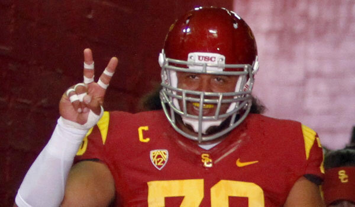 Former USC center Khaled Holmes is the only football player up for Sports Illustrated's award for college athlete of the year.