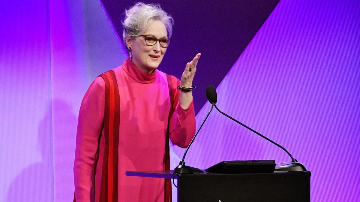 Actress Meryl Streep blows a kiss to the crowd after accepting the Distinguished Collaborator Award during the 19th Annual Costume Designers Guild Awards.