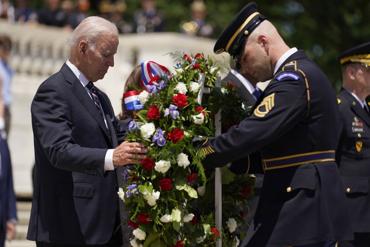 President Biden at the Tomb of the Unknown Soldier at Arlington National Cemetery.