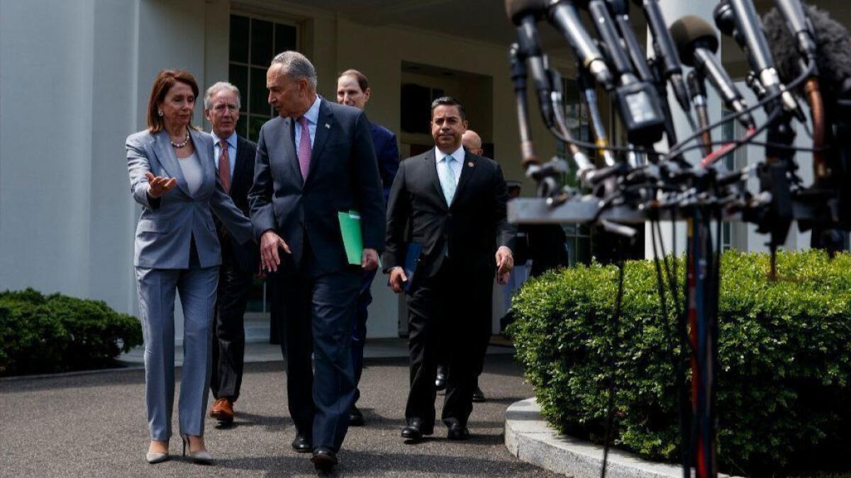 House Speaker Nancy Pelosi and Senate Minority Leader Charles E. Schumer after meeting with President Trump at the White House on Tuesday.