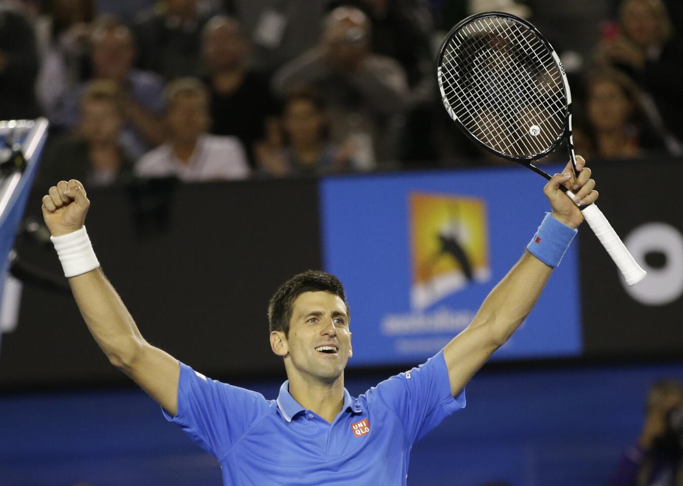 Novak Djokovic of Serbia celebrates after defeating Andy Murray in four sets to win the Australian Open championship on Sunday in Melbourne.
