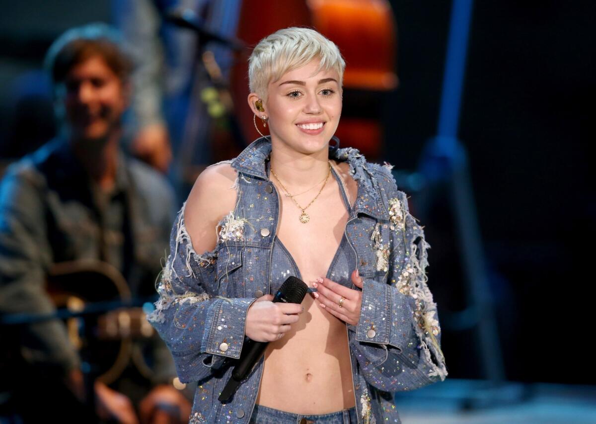 Miley Cyrus performs on MTV's "Unplugged," taped at Sunset Gower Studios in Los Angeles.