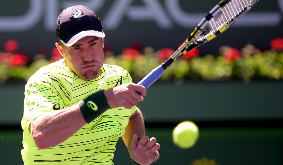 Steve Johnson follows through on a forehand against Marcel Granollers during their match at the Paribas Open on Friday at the Indian Wells Tennis Garden.