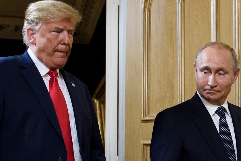 (FILES) In this file photo taken on July 16, 2018 US President Donald Trump (L) and Russian President Vladimir Putin arrive for a meeting in Helsinki. US President Donald Trump insisted July 18, 2018 that his meeting with Vladimir Putin could prove successful, as he tries to quell fury in Washington after appearing to defer to the Russian leader over US intelligence chiefs.The Republican president claimed his meeting with Putin -- who he seemed to warmly embrace, triggering outrage in Washington -- could prove "an even greater success" than his one last week with traditional allies NATO, adding that his counterpart had agreed to assist US negotiation efforts with North Korea. / AFP PHOTO / Brendan SmialowskiBRENDAN SMIALOWSKI/AFP/Getty Images ** OUTS - ELSENT, FPG, CM - OUTS * NM, PH, VA if sourced by CT, LA or MoD **