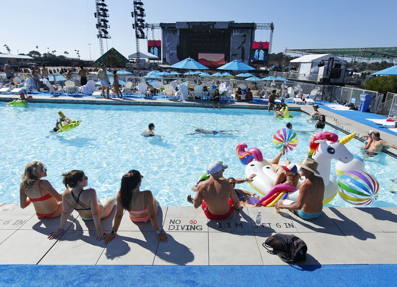 Concert goers relax at the Bask Swim Club at KAABOO Del Mar at Andrew McMahon played on Sept. 13, 2019.