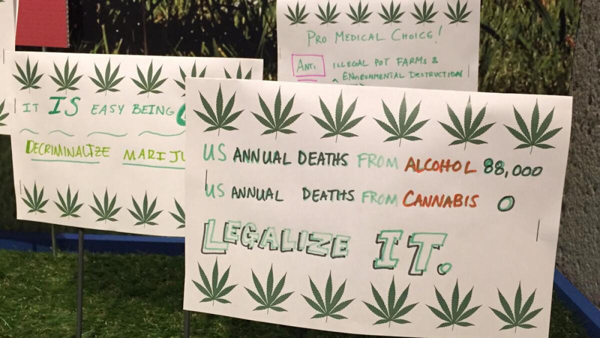 Signs created by visitors to the Oakland Museum's marijuana exhibit in June 2016.