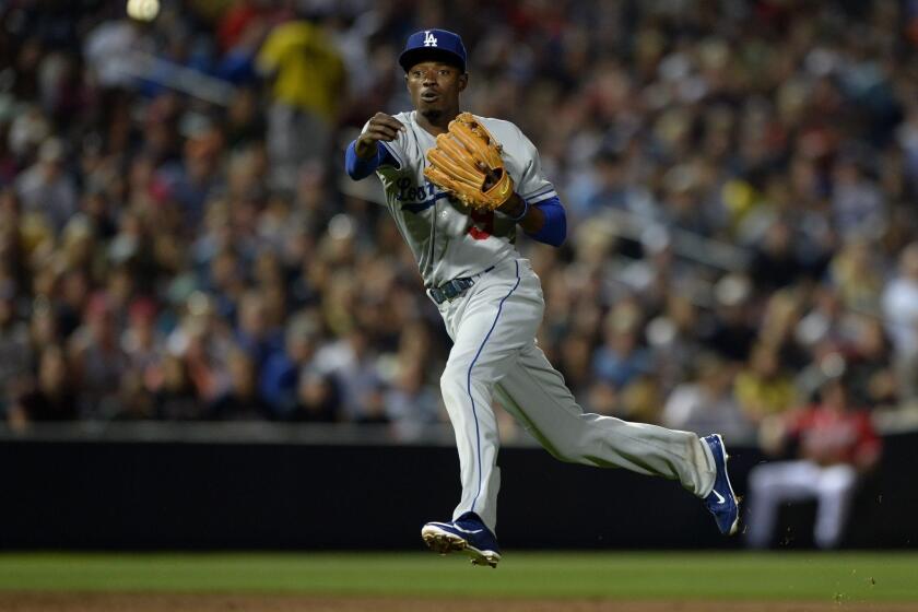 Shortstop Dee Gordon is one of the players working out in center field for the injury-depleted Dodgers.