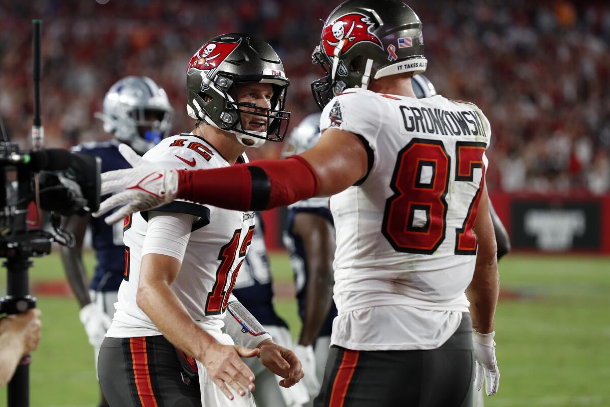 Tampa Bay Buccaneers quarterback Tom Brady, left, celebrates with tight end Rob Gronkowski.