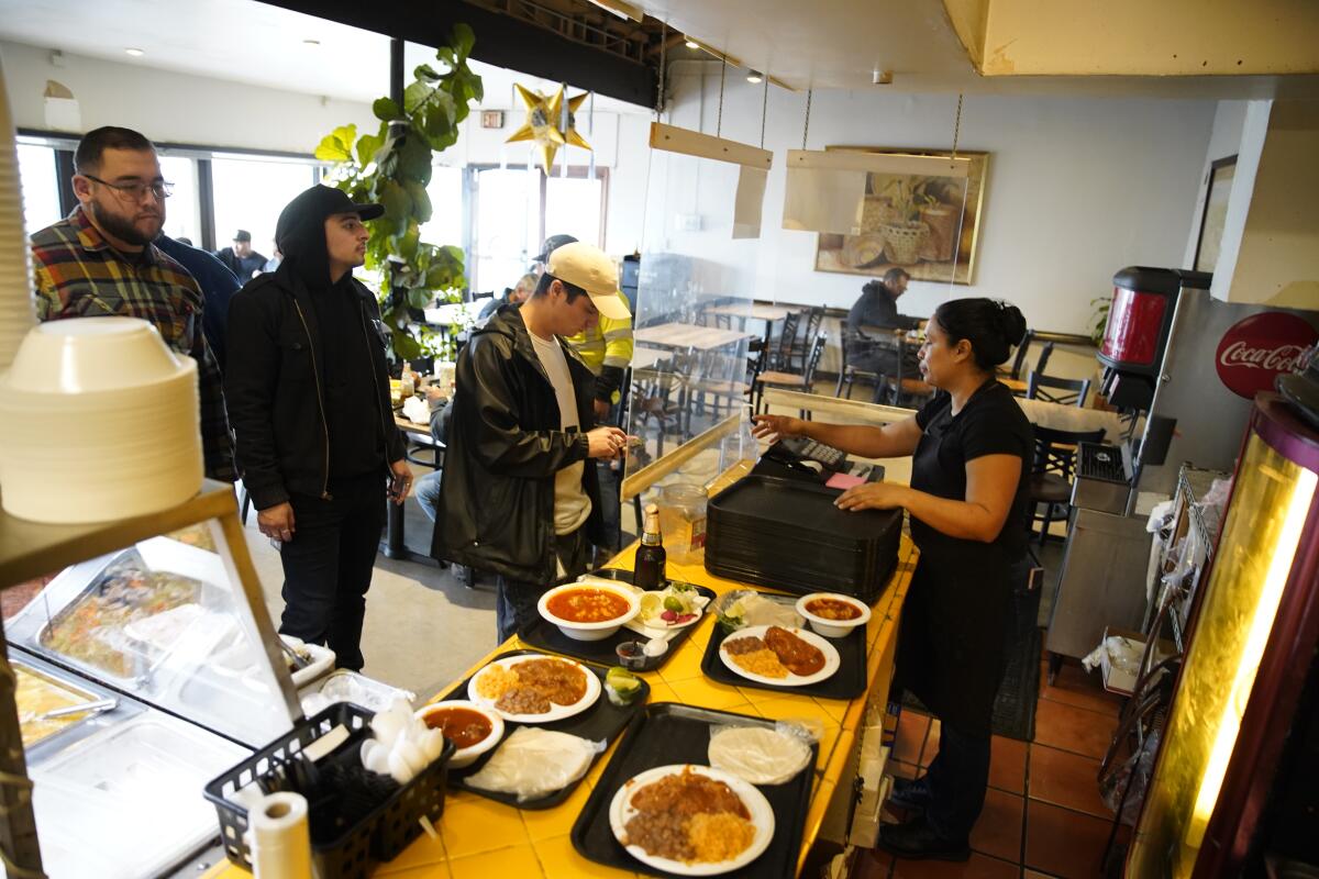 Workers at Super Cocina restaurant in City Heights.