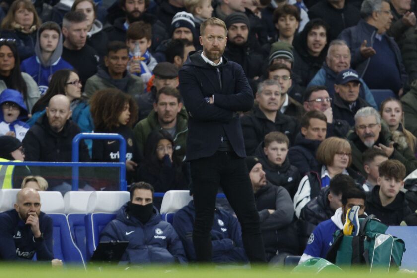 Chelsea's head coach Graham Potter, follows the game during the English Premier League soccer match between Chelsea and Aston Villa at Stamford Bridge stadium in London, Saturday, April 1, 2023. (AP Photo/David Cliff)