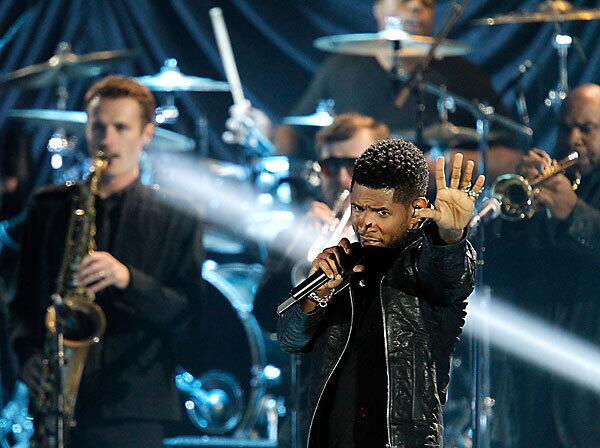 Usher performs