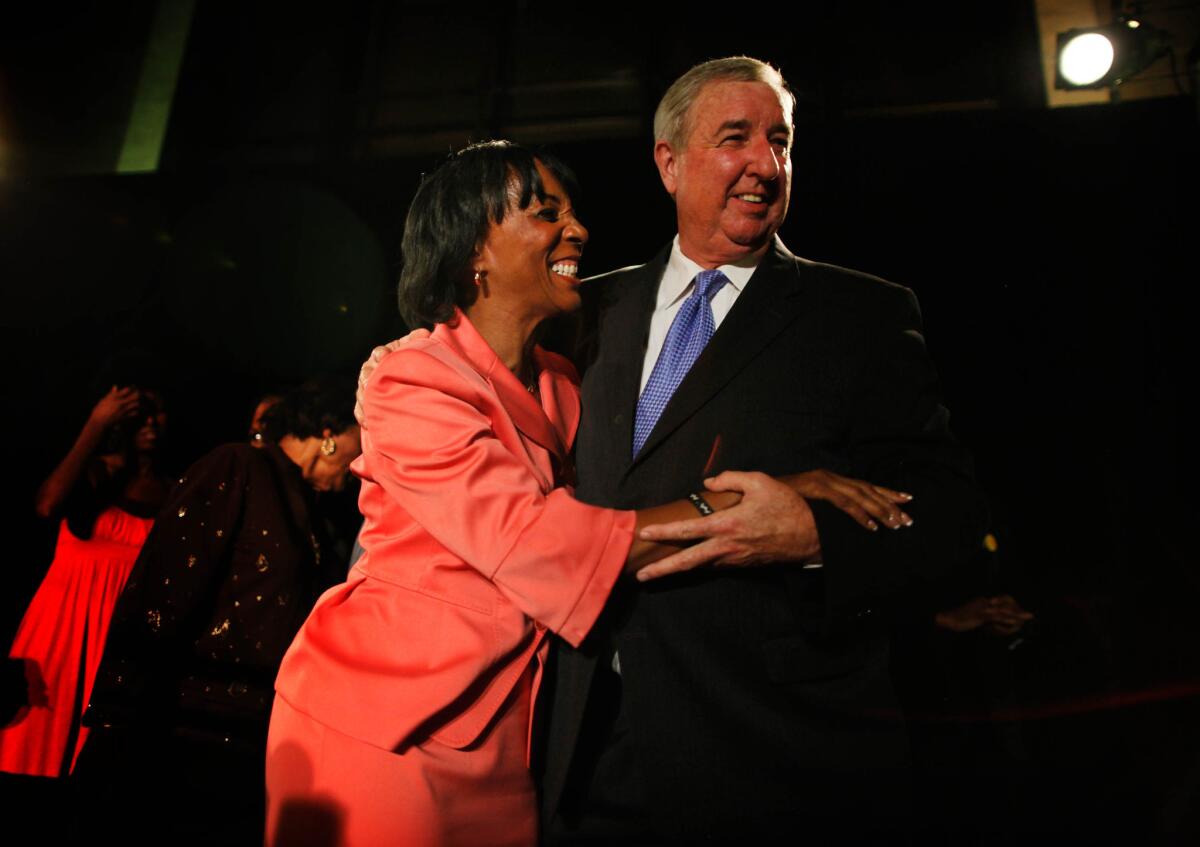 L.A. County Dist. Atty. Jackie Lacey is congratulated on her election victory last year by now-retired Dist. Atty. Steve Cooley.