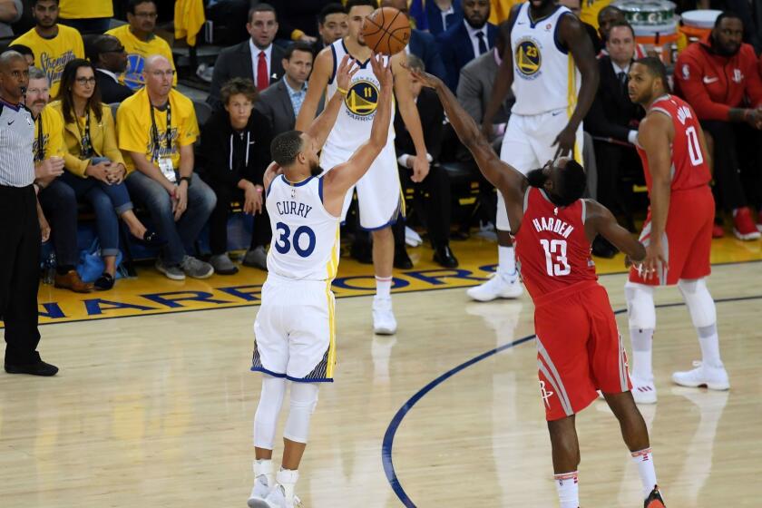 OAKLAND, CA - MAY 20: Stephen Curry #30 of the Golden State Warriors takes a shot against James Harden #13 of the Houston Rockets during Game Three of the Western Conference Finals of the 2018 NBA Playoffs at ORACLE Arena on May 20, 2018 in Oakland, California. NOTE TO USER: User expressly acknowledges and agrees that, by downloading and or using this photograph, User is consenting to the terms and conditions of the Getty Images License Agreement. (Photo by Thearon W. Henderson/Getty Images) ** OUTS - ELSENT, FPG, CM - OUTS * NM, PH, VA if sourced by CT, LA or MoD **
