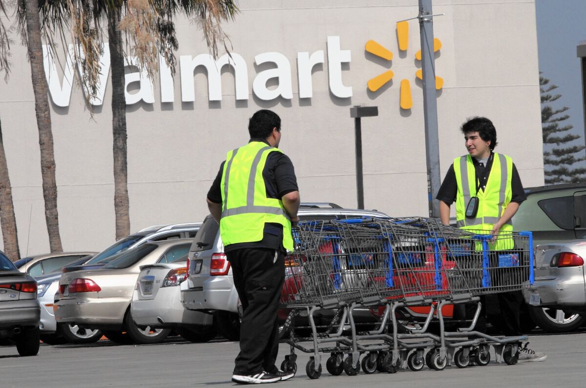 Starting in April, about 500,000 Wal-Mart employees will get a raise to the new level — $1.75 an hour more than the federal minimum wage.