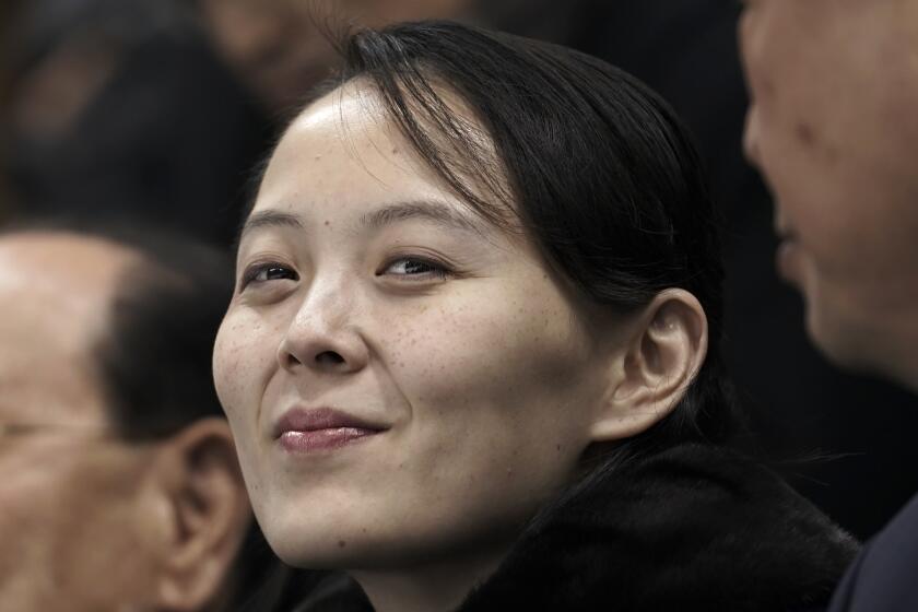 FILE - In this Feb. 10, 2018, file photo, Kim Yo Jong, sister of North Korean leader Kim Jong Un, waits for the start of the preliminary round of the women's hockey game between Switzerland and the combined Koreas at the 2018 Winter Olympics in Gangneung, South Korea. The powerful sister dismissed prospects for early resumption of diplomacy with the United States, saying the U.S. expectations for talks would “plunge them into a greater disappointment.” Kim made the comments Tuesday, June 22, 2021 after U.S. National Security adviser Jake Sullivan described as “interesting signals” Kim Jong Un’s recent statement that North Korea will be ready for both dialogue and confrontation, but more for confrontation. (AP Photo/Felipe Dana, File)