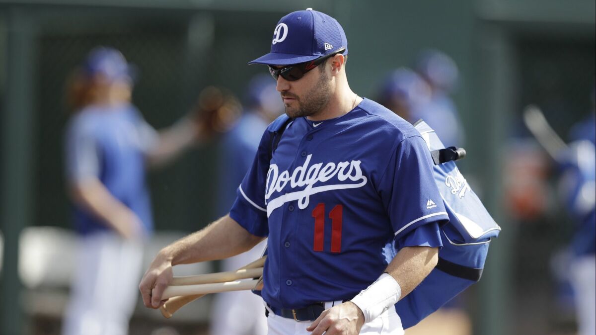 Dodgers center fielder A.J. Pollock, who played for the Arizona Diamondbacks the last seven seasons, makes his way to the field before a spring-training game last month. Says Pollock: "I’m over the weirdness of being on a new team now.”