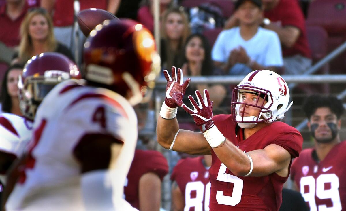 Stanford running back Christian McCaffrey hauls in a touchdown pass in the first quarter against USC.