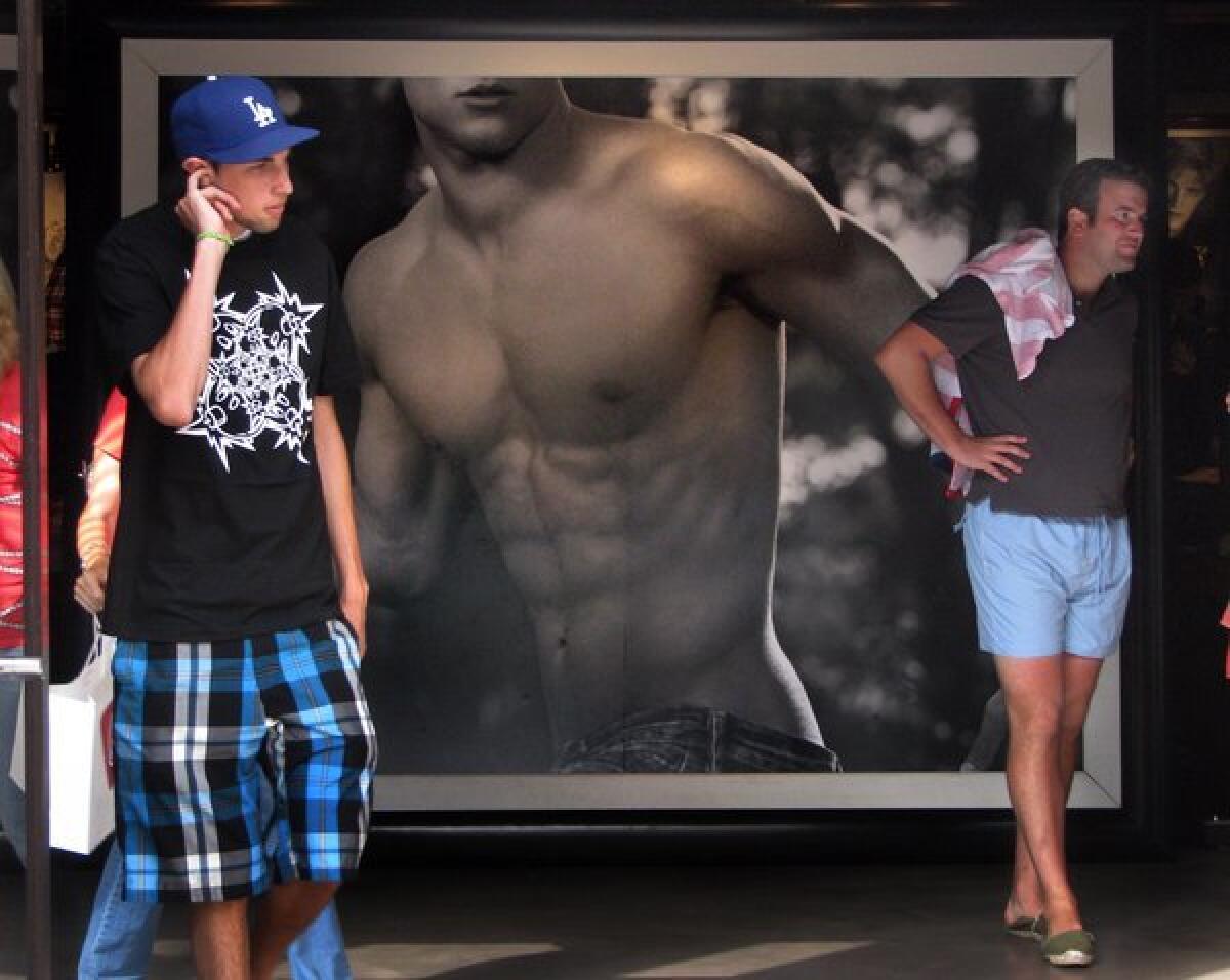 Shoppers at the entrance of the Abercrombie and Fitch store in the 3rd St. Promenade in Santa Monica.