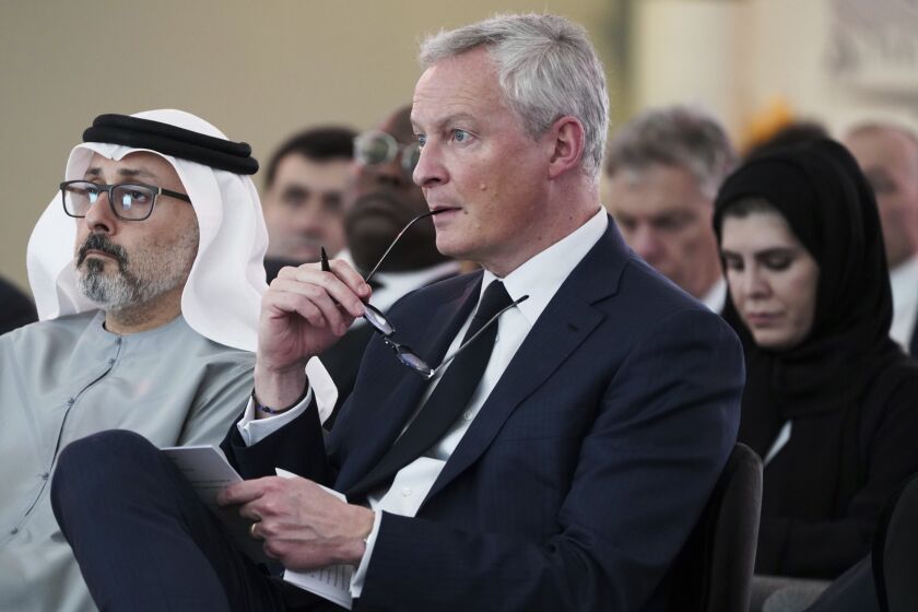 French Finance Minister Bruno Le Maire attends a conference in Abu Dhabi, United Arab Emirates, Monday, Jan. 30, 2023. Le Maire said Monday that pension reforms being pushed by French President Emmanuel Macron were necessary despite facing protests and growing opposition back home. (AP Photo/Jon Gambrell)