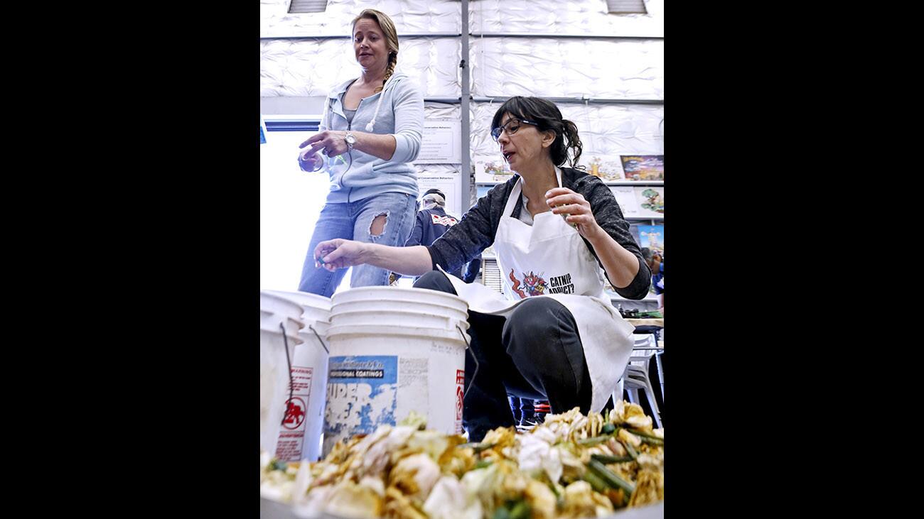 Photo Gallery: Annual tear down of the Burbank Rose Parade float