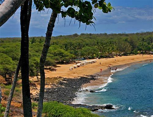 Waves lap the sand at Hulopoe Beach, near the Lodges sister inn, the Four Seasons Resort Lanai at Manele Bay. Guests at the Lodge, which is inland, can hop a shuttle for the beach.