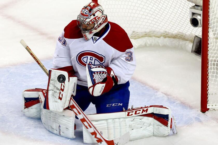Canadiens goaltender Carey Price makes a save against the Bruins in a 3-1 victory in Game 7 of their Eastern Conference semifinal series.