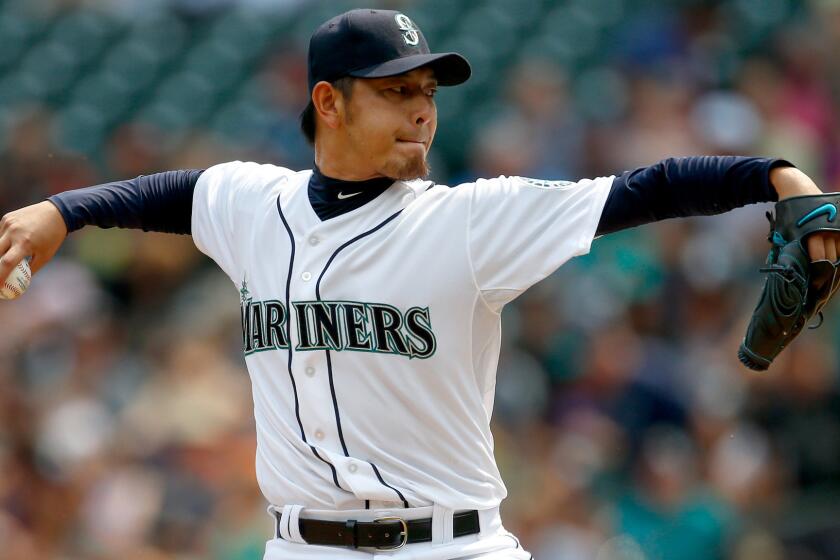 Mariners starter Hisashi Iwakuma struck out seven and walked three in pitching a no-hitter against the Orioles on Aug. 12 in Seattle.