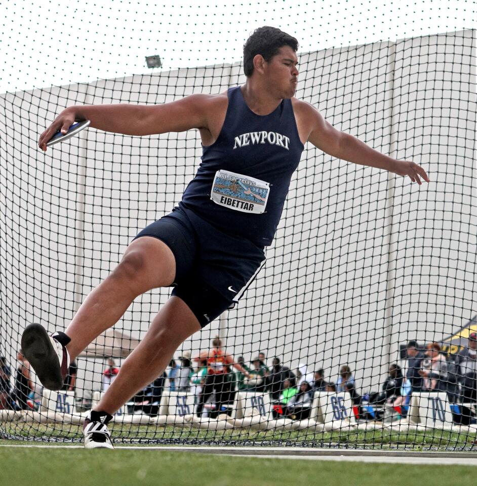 Newport Harbor High School athlete Aidan Elbettar throws the discus at the 61st annual Mt. SAC Relays, held at El Camino College in Torrance on Saturday, April 20, 2019.