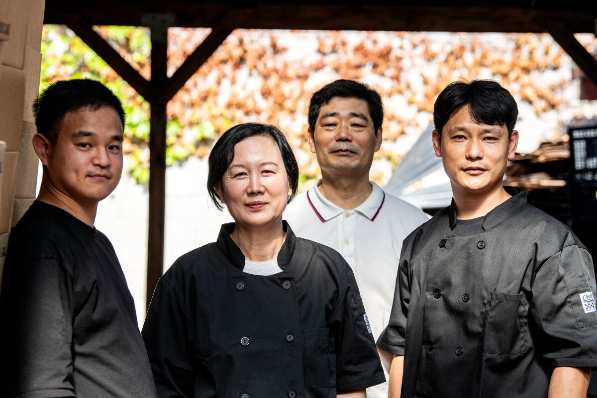 The family that owns and operates Kae Sung Market.