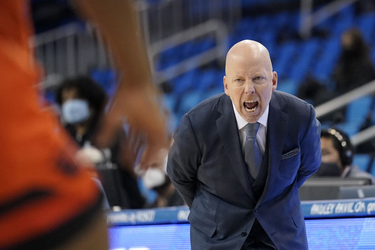 UCLA head coach Mick Cronin yells to his team during the first half.
