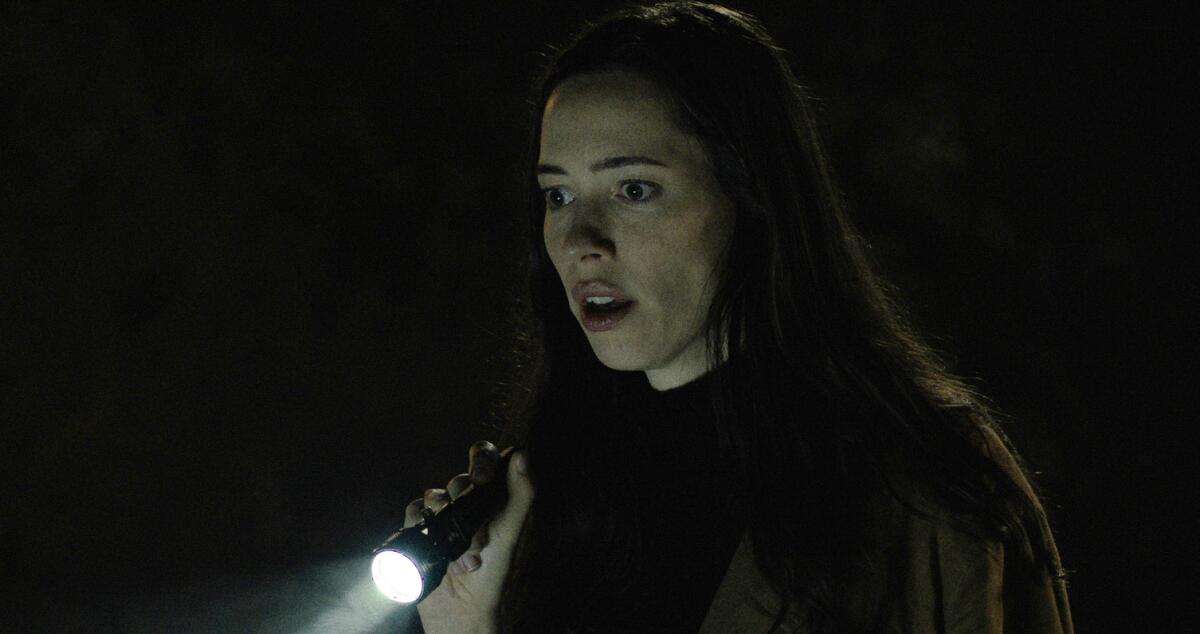 Rebecca Hall appears in a scene from the film "The Night House." (Searchlight Pictures via AP)