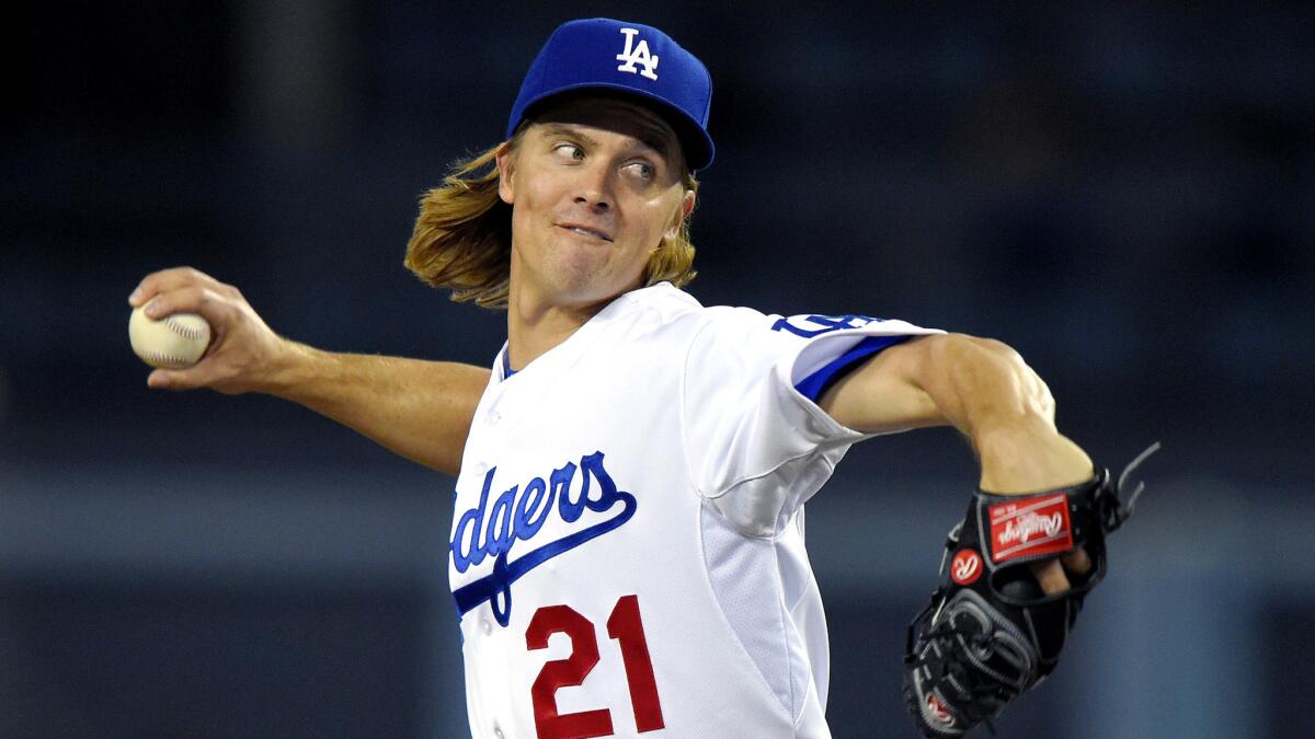 Dodgers starter Zack Greinke throws in the first inning of a win against the Pirates at Dodger Stadium on Sept. 18.