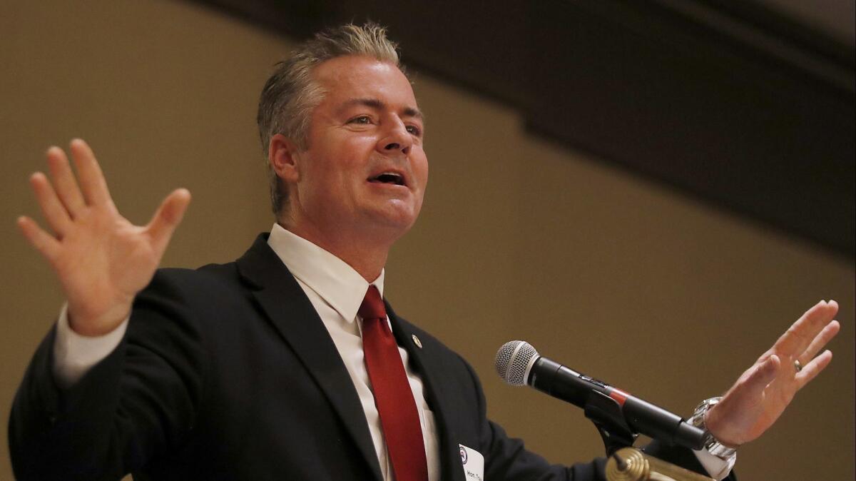 Travis Allen, a candidate for chair of the California Republican Party, speaks to a meeting of the Orange County GOP in Costa Mesa.