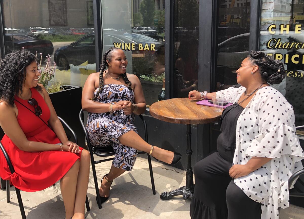 Oriana Powell, center, seen with fellow participants at an issues forum for black women in Detroit, regrets not voting for president in 2016. She plans to vote and be more politically active in the 2020 campaign.