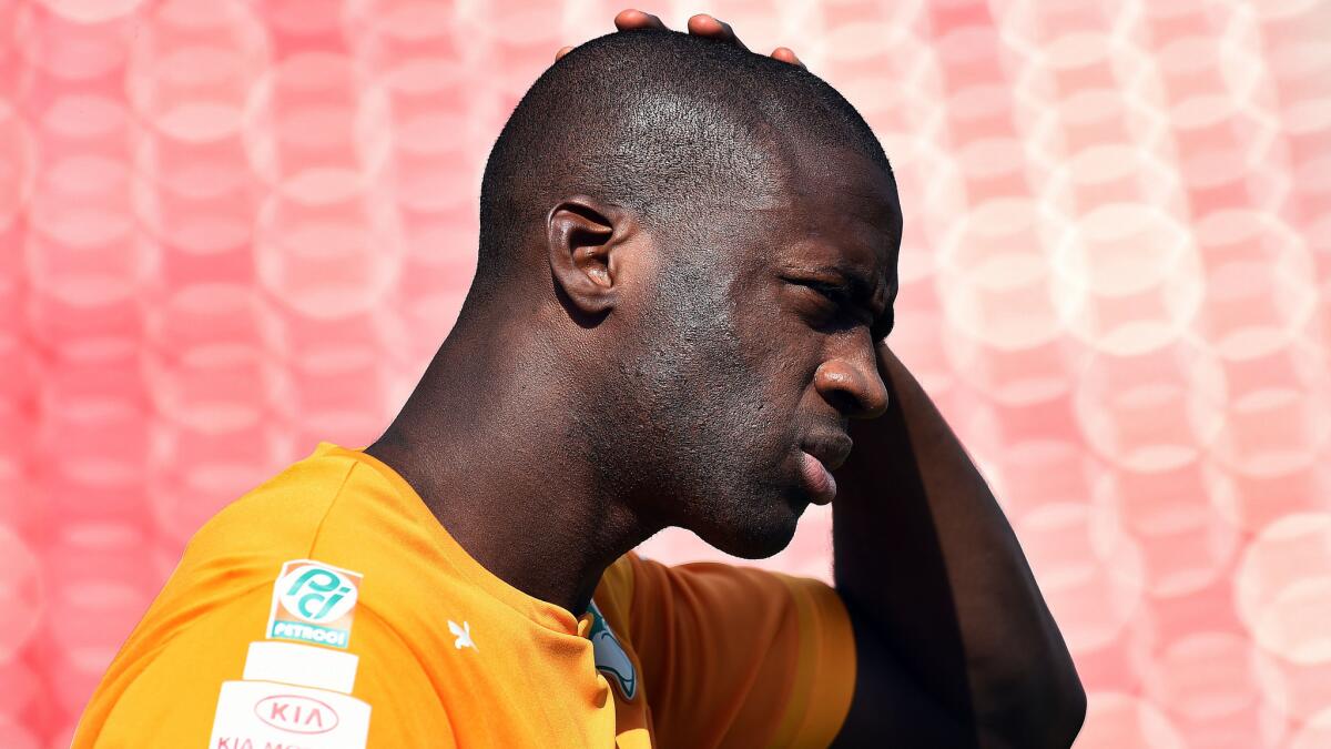 Ivory Coast midfielder Yaya Toure arrives for a training session in Frisco, Texas, on Tuesday. The West African nation hopes the team's high level of experience will make for a memorable World Cup effort.