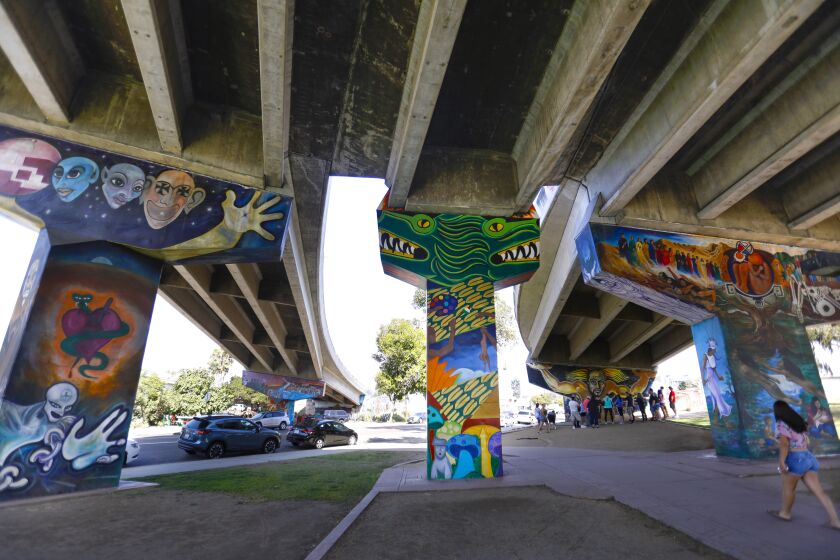 Murals adorn the sides of the columns supporting the portion of the San DiegoÐCoronado Bridge in Chicano Park, that is under the bridge, in Barrio Logan. Photographed July 25, 2019, in San Diego, California. The bridge is turning 50-years-old on August 3.