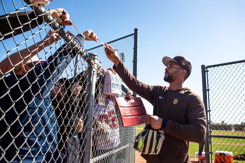 Peoria, AZ - February 16: Padres shortstop Xander Bogaerts signs autographs for fans during a spring training practice at Peoria Sports Complex on Thursday, Feb. 16, 2023 in Peoria, AZ. (Meg McLaughlin / The San Diego Union-Tribune)