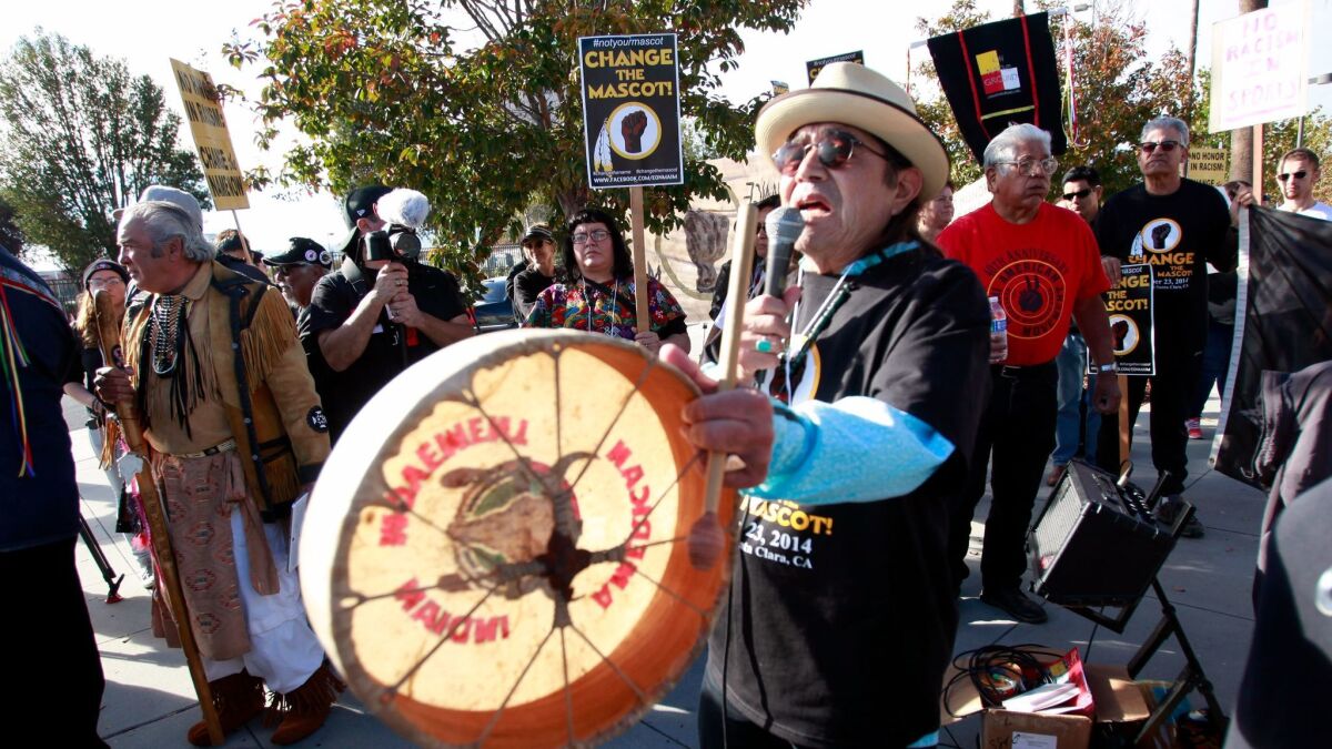 Tony Gonzalez leads a protest in Santa Clara in 2014 against the use of "Redskins" as a team mascot.