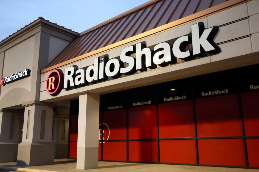 RadioShack, which introduced the first mass-market personal computer, is fading after years of heavy losses and the suspension of its shares.