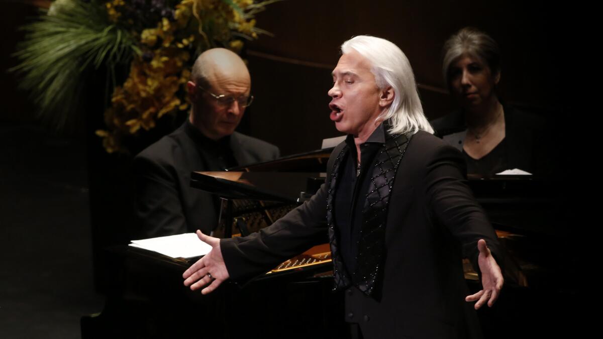 Russian baritone, Dimitri Hvorostovsky, right, accompanied by pianist Ivar Ilja.